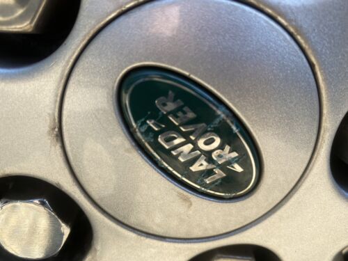 Used Land Rover 63mm wheel centre caps RRJ500030XXX Green and Silver Grade B