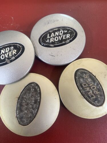 Used Land Rover 63mm wheel centre caps RRJ500030XXX Black and Silver Grade B