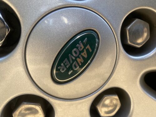 Used Land Rover 63mm wheel centre caps RRJ500030XXX Green and Silver Grade B