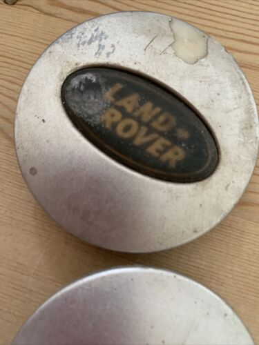 2 X Land Rover 63mm wheel centre cap. RRJ500030XXX in poor condition. see pics