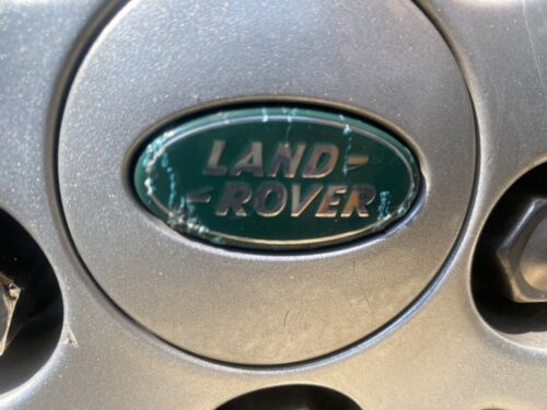 Used Land Rover 63mm wheel centre caps RRJ500030XXX Green and Silver Grade B