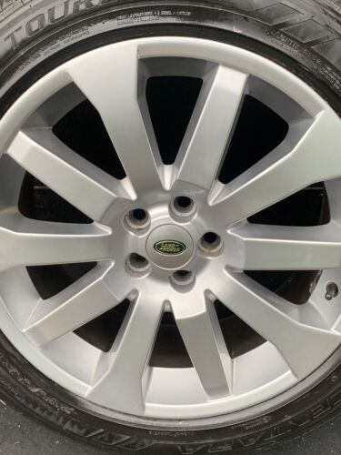 Set of used 4 Silver & Green Land Rover alloy wheel caps 63mm.