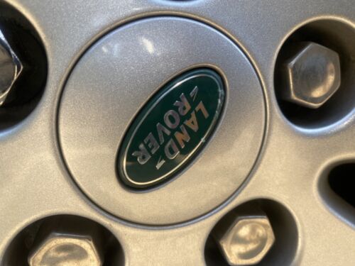 Used Land Rover 63mm  wheel centre caps RRJ500030XXX  Green and Silver Grade B