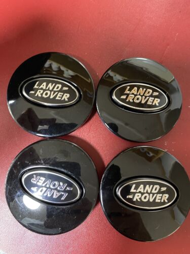 4X LAND ROVER BLACK & Black ALLOY WHEEL CENTRE CAPS 63MM USED GRADE B.