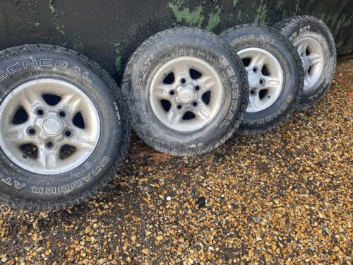 1x Genuine Used Land Rover Defender Freestyle Alloy Wheel Centre Cap 75mm