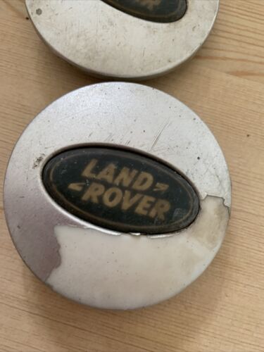 2 X Land Rover 63mm  wheel centre cap.  RRJ500030XXX in poor condition. see pics