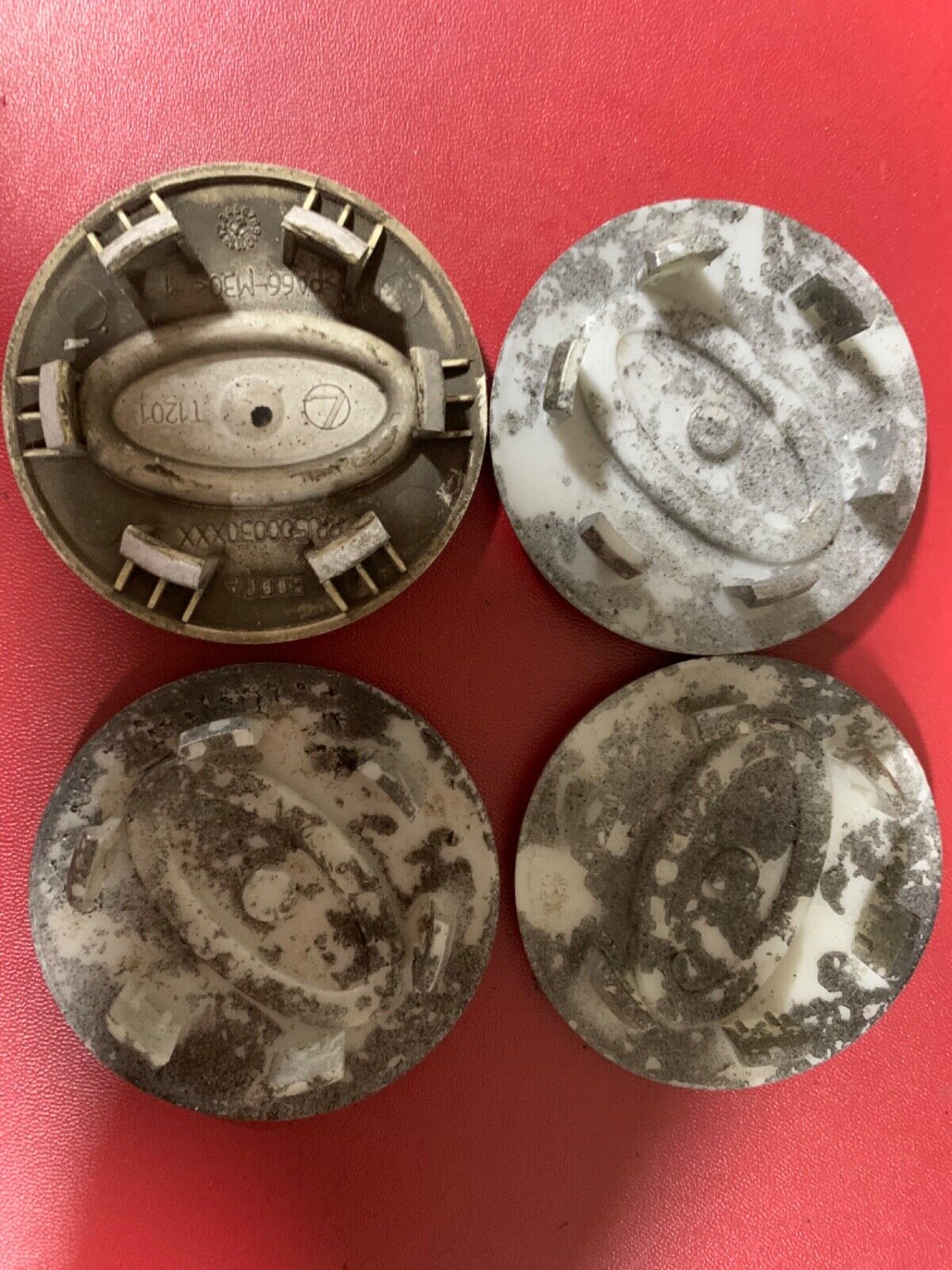 Set of used 4 Silver & Green Land Rover alloy wheel caps 63mm.